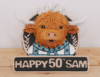 The Kilted Baker Highland Cow cake