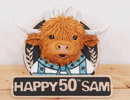 The Kilted Baker Highland Cow cake